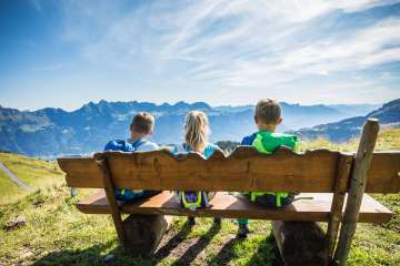 Children, mountains, sun