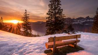 Sunbeds in winter with a view of Lake Walen