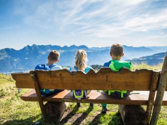 Children, mountains, sun