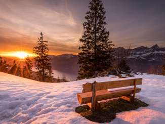 Sunbeds in winter with a view of Lake Walen
