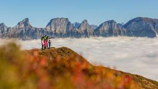 Family on the Flumserberg above the sea of fog