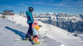 Children, snow, family skiing