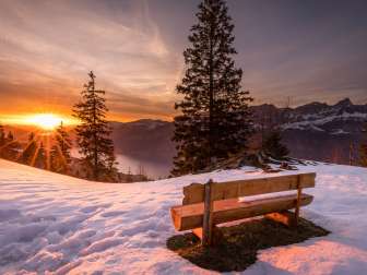 Sunbeds in winter with a view of Lake Walen