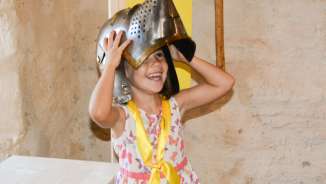 A girl explores the children's trail in Sargans Castle.